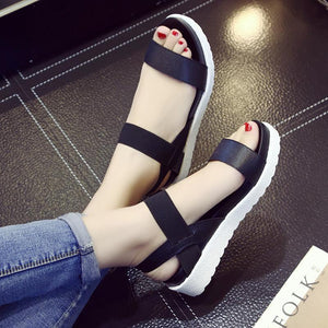 The black Straps white Sandals.