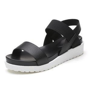 The black Straps white Sandals.