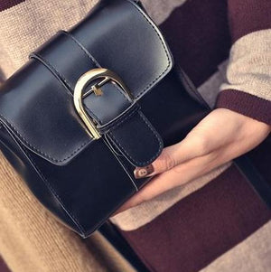 The flap shoulder bag.